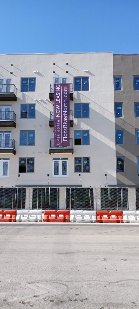 banners now leasing sign